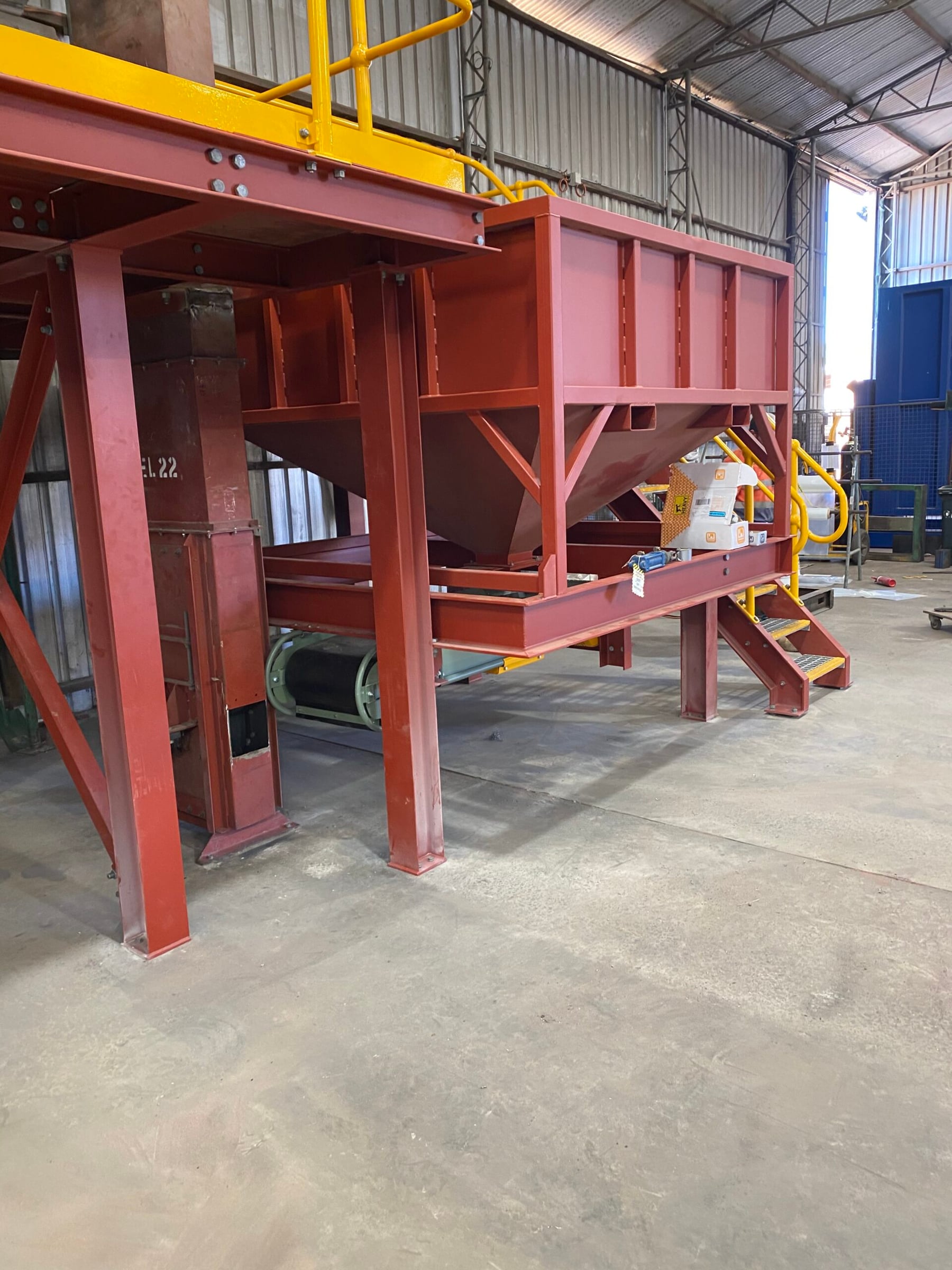Structural steelwork and platform framing under assembly in the workshop